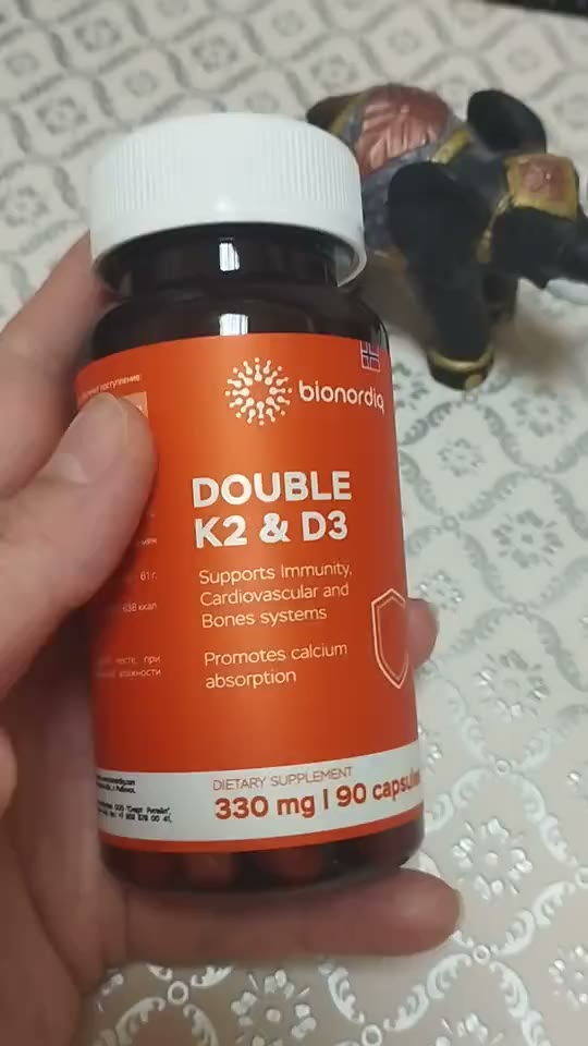 Кадр из видео покупателя №1 из 6: Витамины D3 и K2 для костей и сосудов Double K2 D3 bionordiq 330 мг 90 капсул, холекальциферол менахинон, витамин д3 к2, для иммунитета, витамины, БАД, для здоровья, для женщин и мужчин, для зубов, отзыв на 5 из 5, Ozon, 3 марта 2026